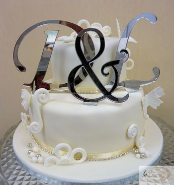 2 tier ivory wedding cake with initials