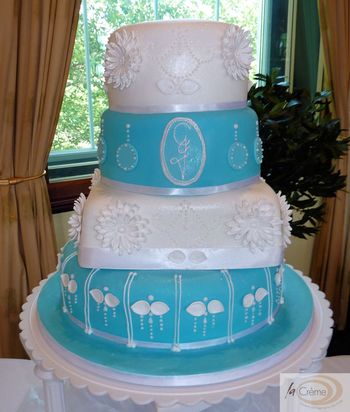 4 tier blue white wedding cake