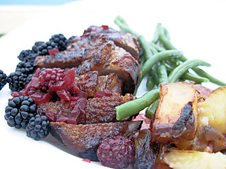 Duck with blackberries