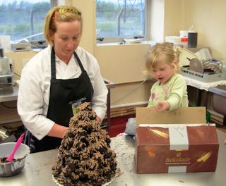 Sian and Isabel making a croquembouche