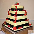 4 Tier Black & Ivory, Chocolate & Fruit Wedding Cake