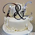 2 tier ivory wedding cake with initials