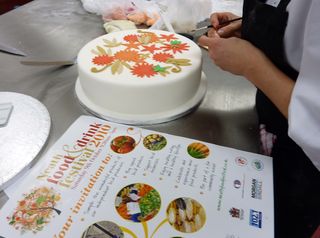 Mel making the Neath food festival cake