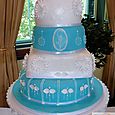 4 tier blue & white wedding cake