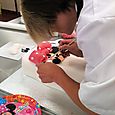 Mel making minnie mouse cake