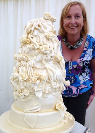 3 tier satin drape Wedding Cake with ivory roses