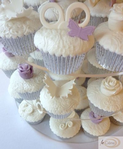 Embossed violet and white fondant cup cakes s