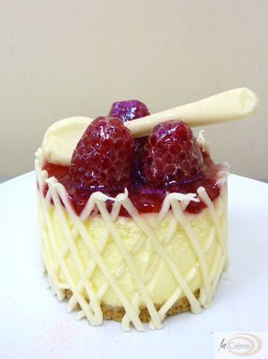 Raspberry Torte with white chocolate collar and chocolate spoon s