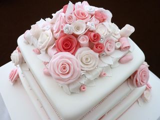 3 tier pink and white wedding cake 2s